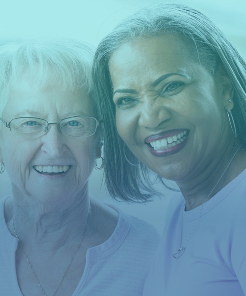 two happy diverse elderly women